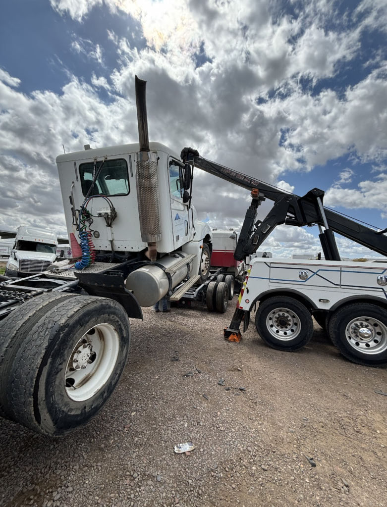 white-truck-towing